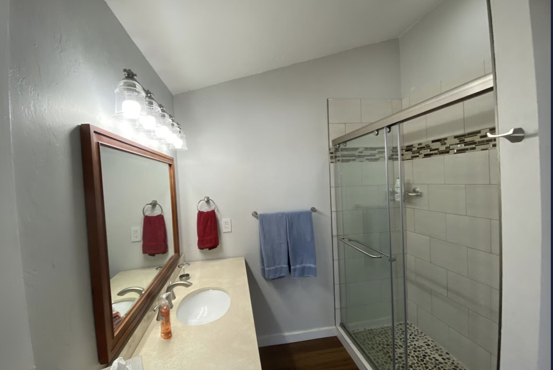 Carriage house full bathroom with shower