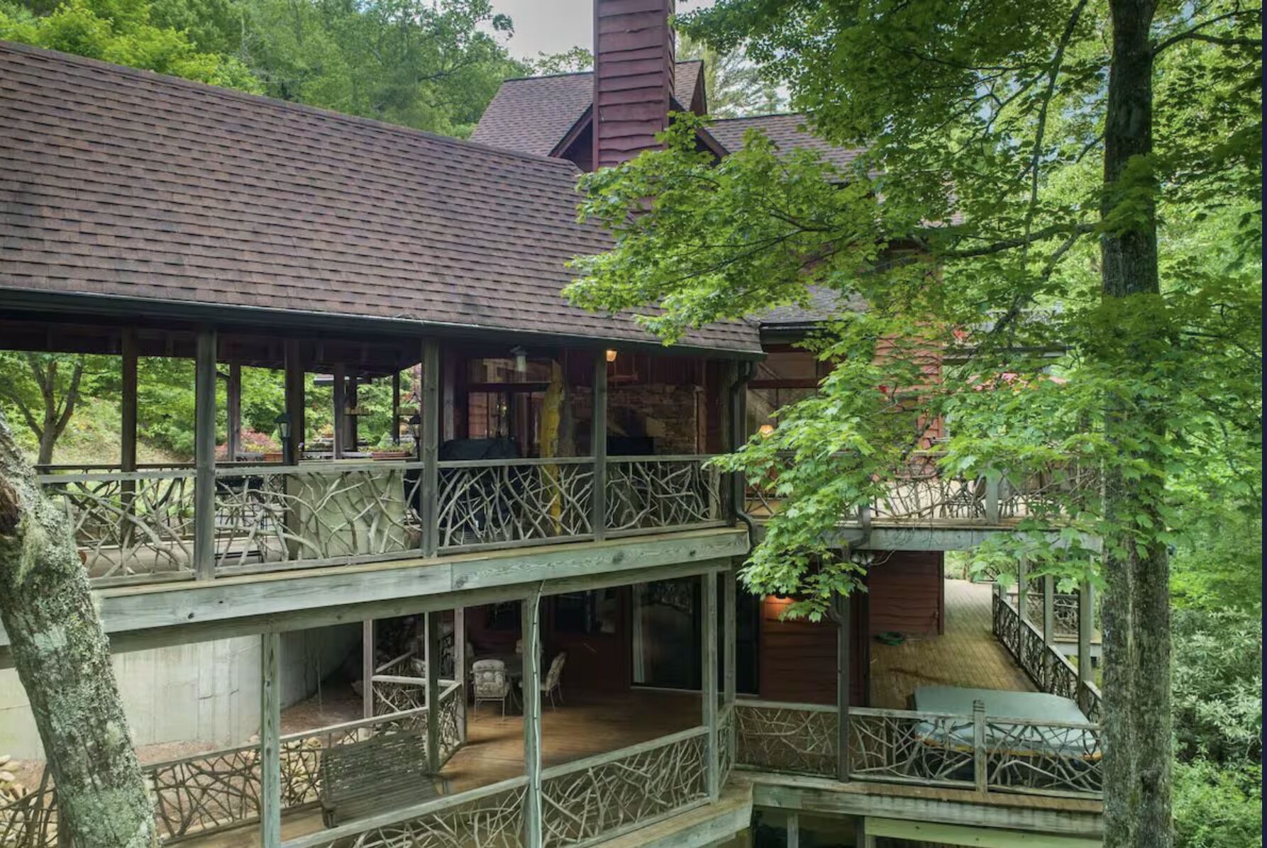 Two levels of covered decks along the back of the house