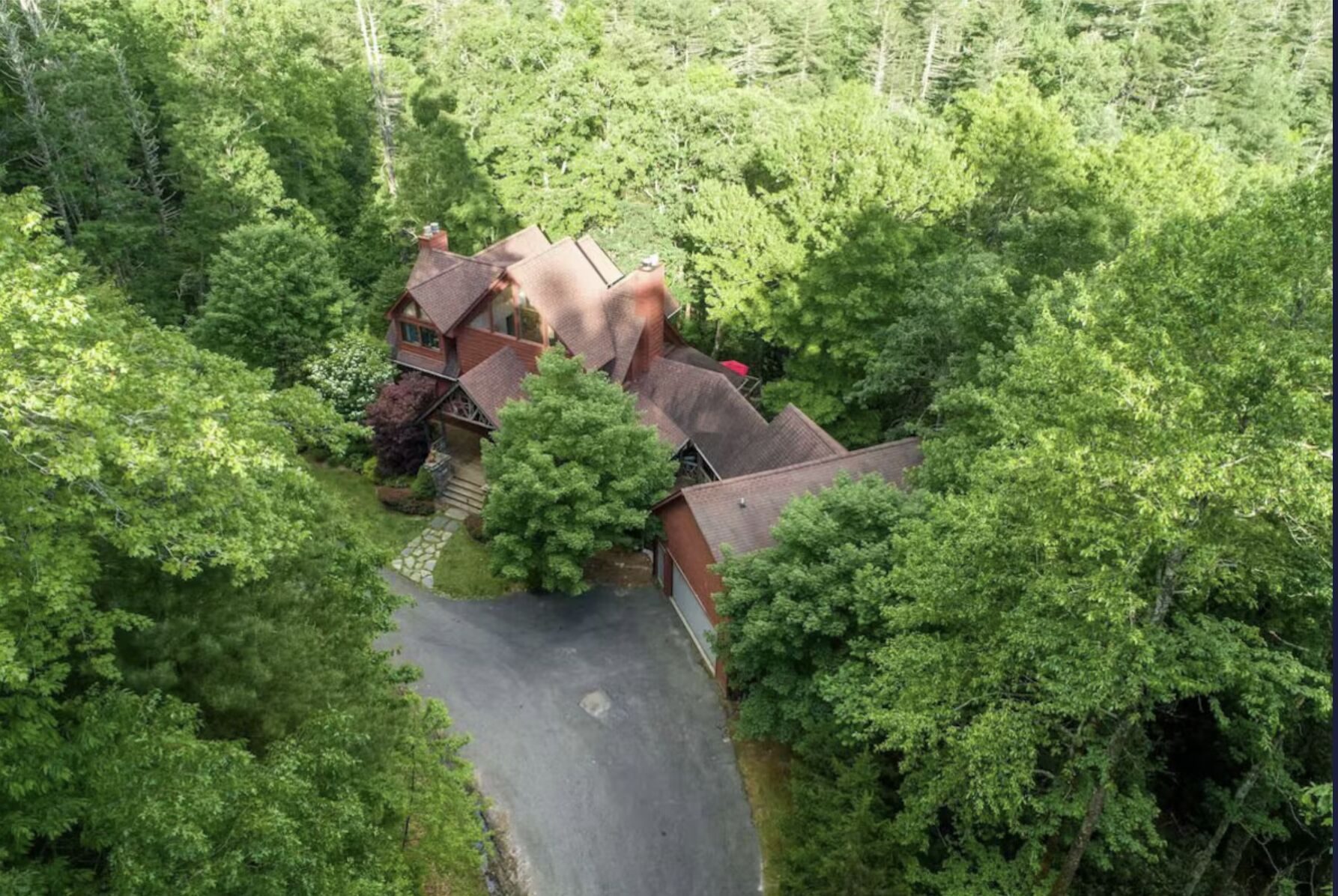Aerial view of Lotts of Sky and its decks in the forest