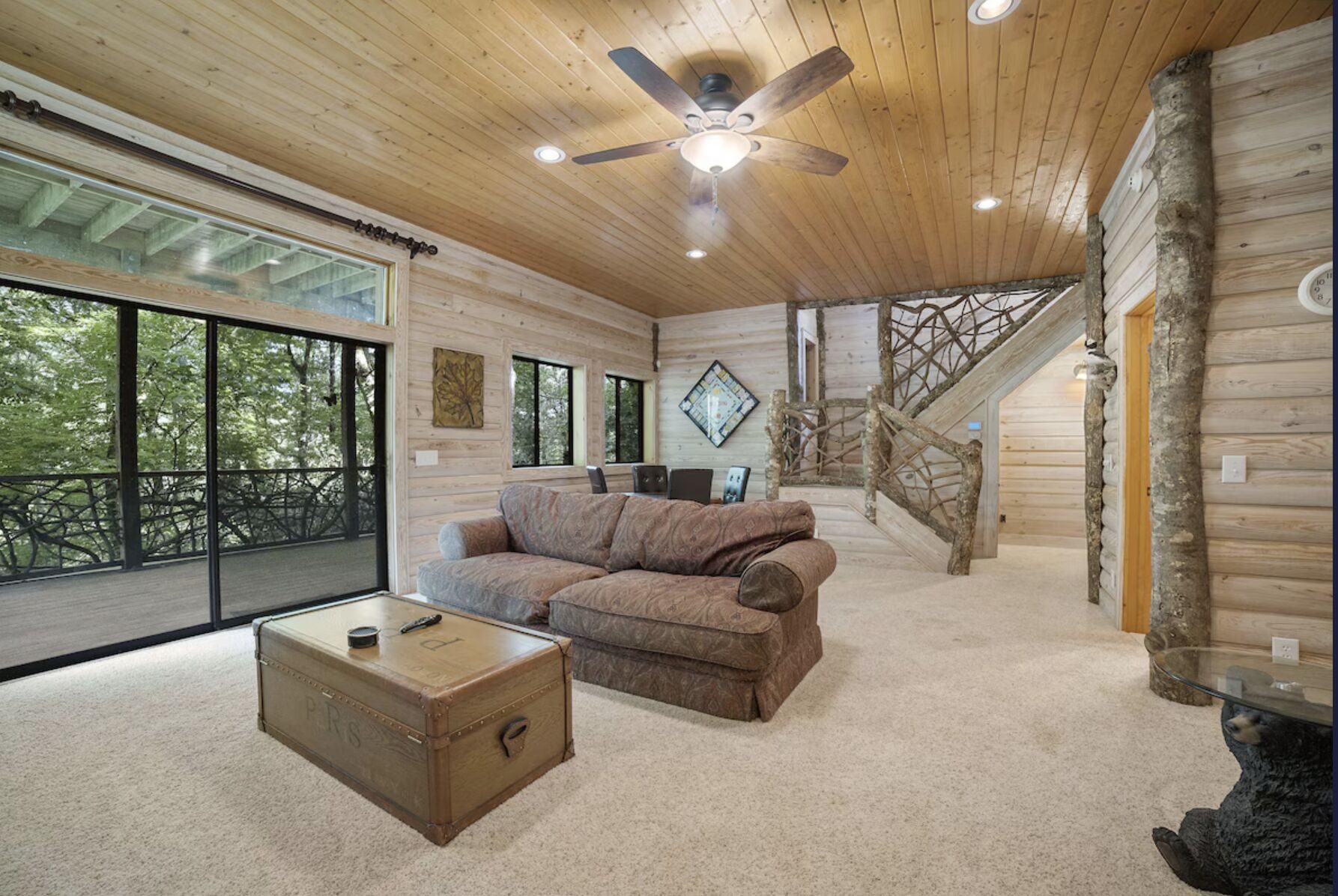 Lower-level den with sofas and board games
