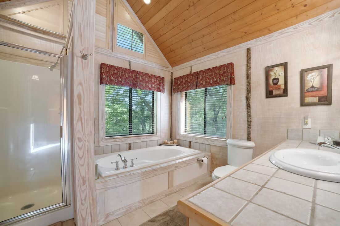 Primary ensuite with soaking tub and separate shower