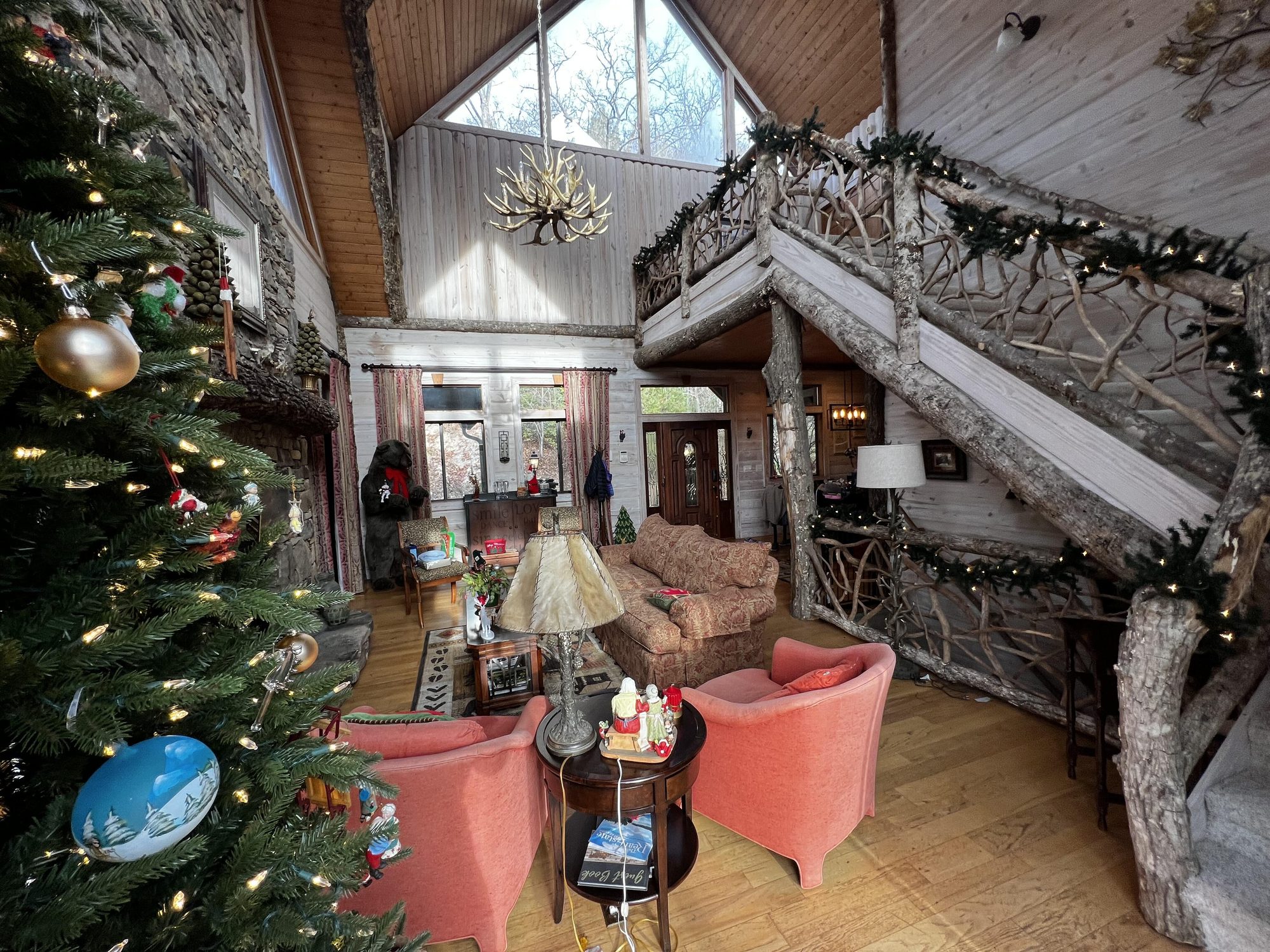 Great room with the fire lit on a mountain evening